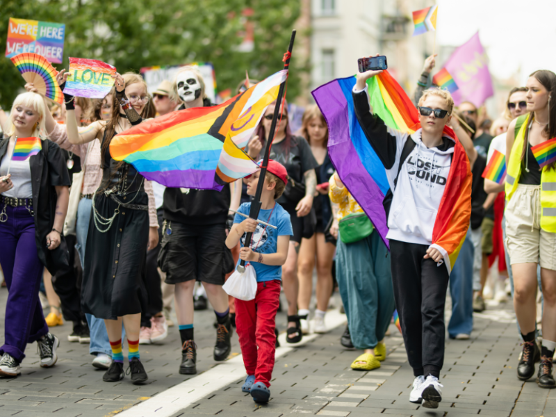 People participating in a pride march